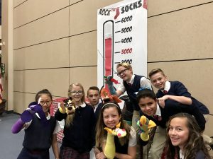 students and sock puppets